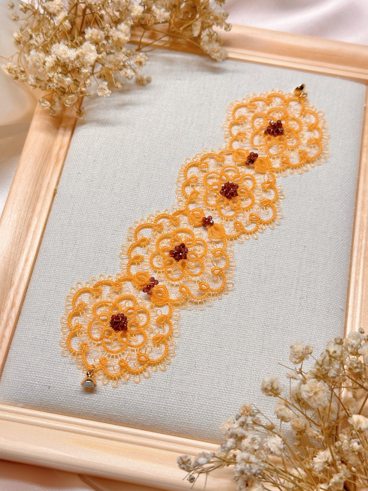 Floral Orange Lace Bracelet with Garnet Beads – Handcrafted Tatting Jewelry, 16 cm